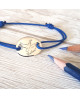 Les Empreintes : bracelet cordon mini galet or jaune