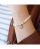 Bracelet perle personnalisé mini charm blanc - Petits Trésors