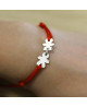 Loupidou : bracelet cordon 2 personnages en or