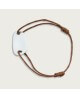 Les Empreintes : bracelet galet carré en argent sur cordon